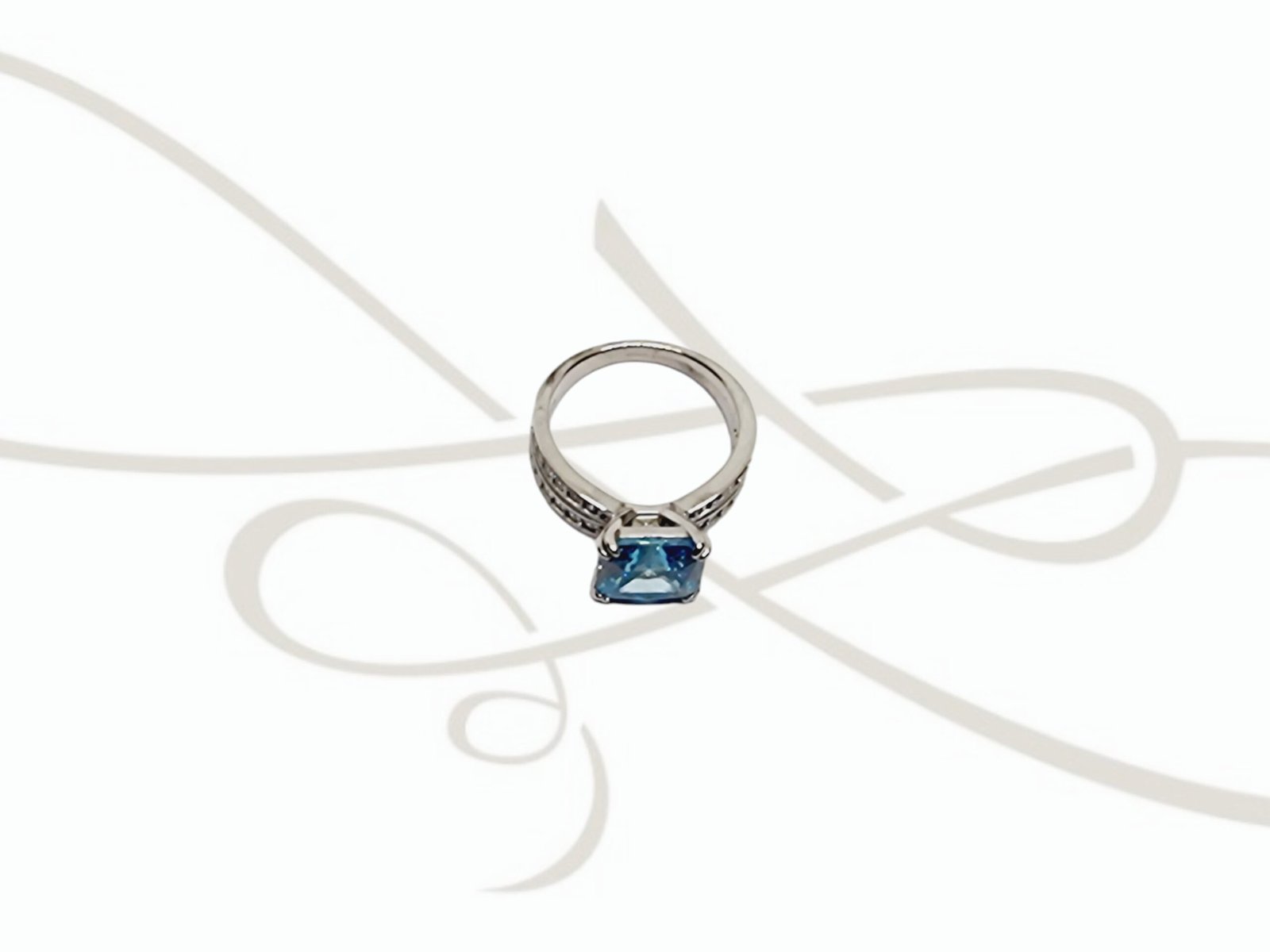 ANILLO PLATA RODIZADA CUADRO PRINCESS TOPACIO AZUL