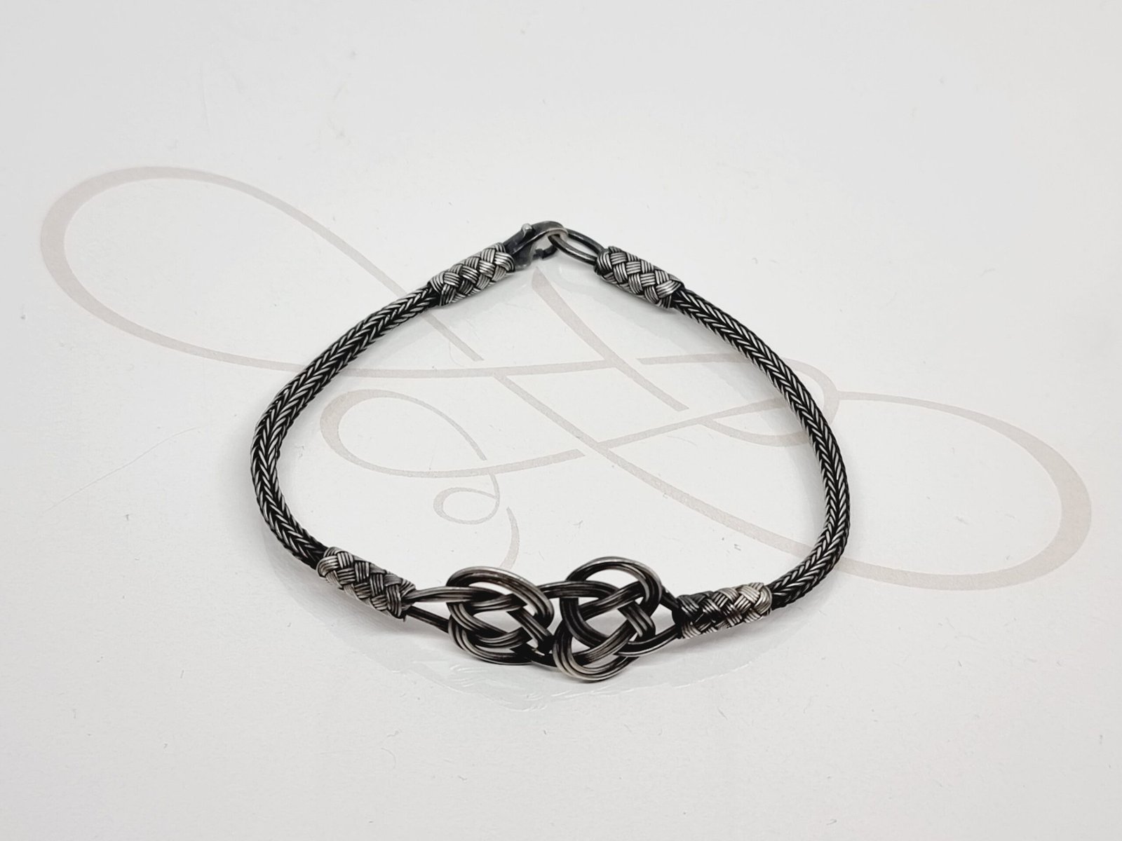PULSERA CELTA PLATA PAVONADA