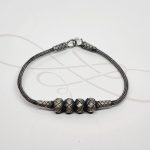 PULSERA CUATRO BOLAS PLATA PAVONADA