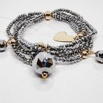 PULSERA CON DIJES QUINTUPLE HILO CRISTAL PLATEADO