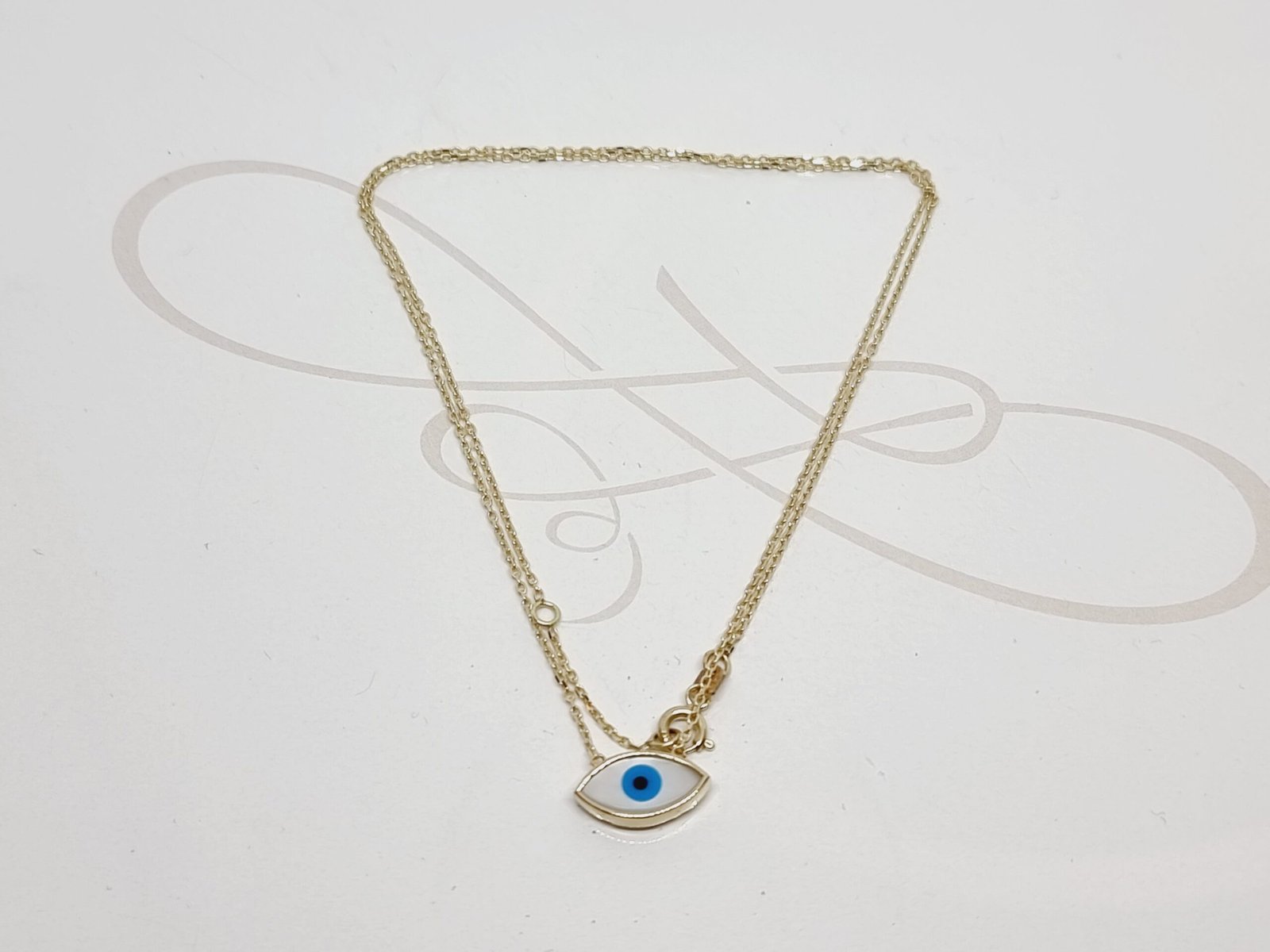 COLLAR OJO TURCO MADRE PERLA ORO 10K
