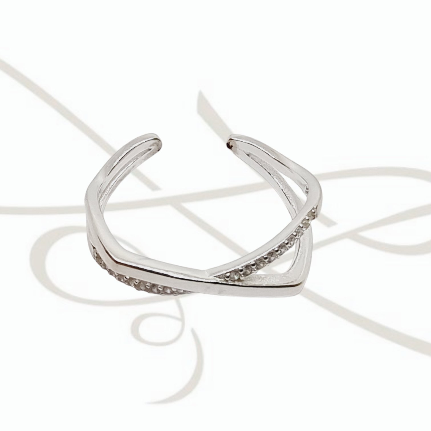 ANILLO PLATA LINEAS CRUZADAS CON ZIRCONIA Y LISO