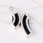 DIJE PLATA CRUZ ENCONTRADA CAUCHO