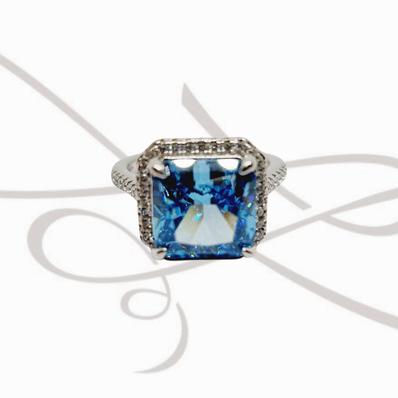 ANILLO PLATA RODIZADA CUADRADO CON HALO BLUE DIAMOND