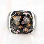 ANILLO ACERO CIRCULO FLORES ENCAPSULADO