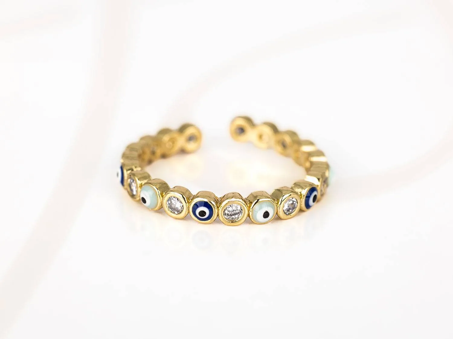 ANILLO ACERO OJITOS COLORES ZIRCONIA