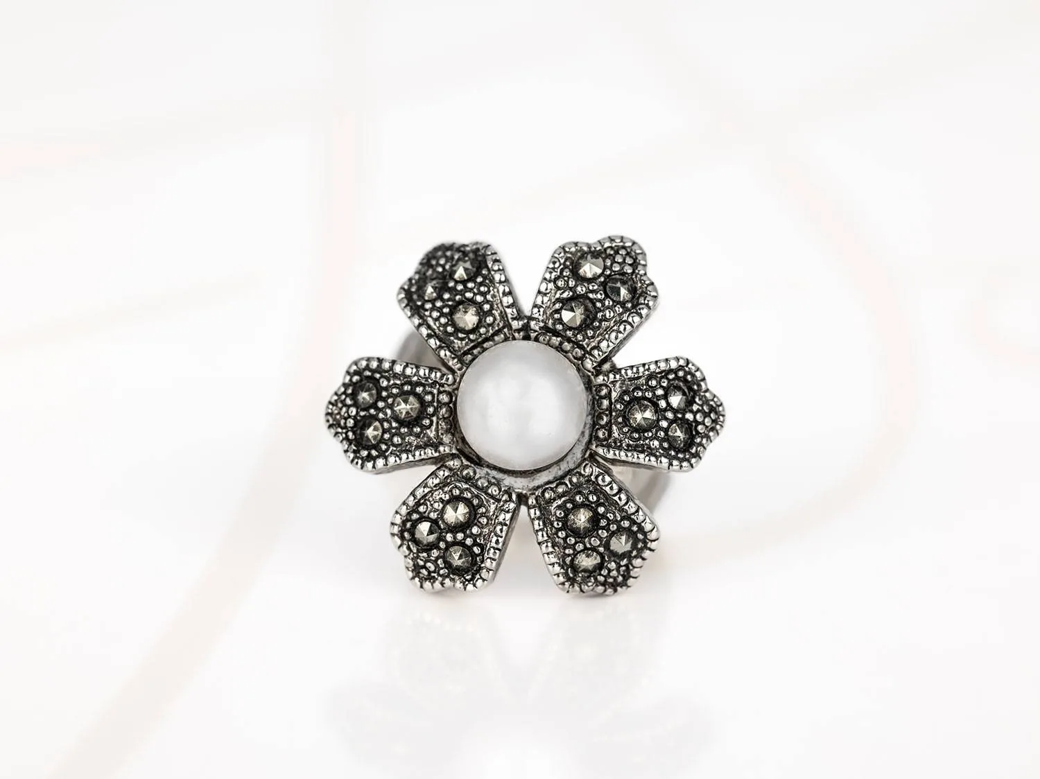 ANILLO ACERO FLOR PERLA ZIRCONIA