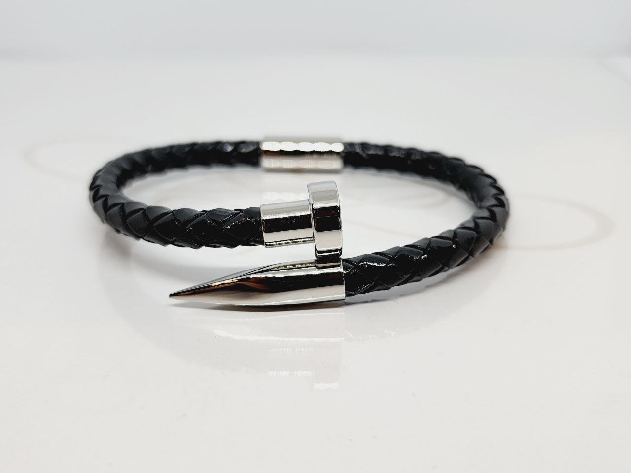 PULSERA PIEL TRENZADA GRIS CLAVO