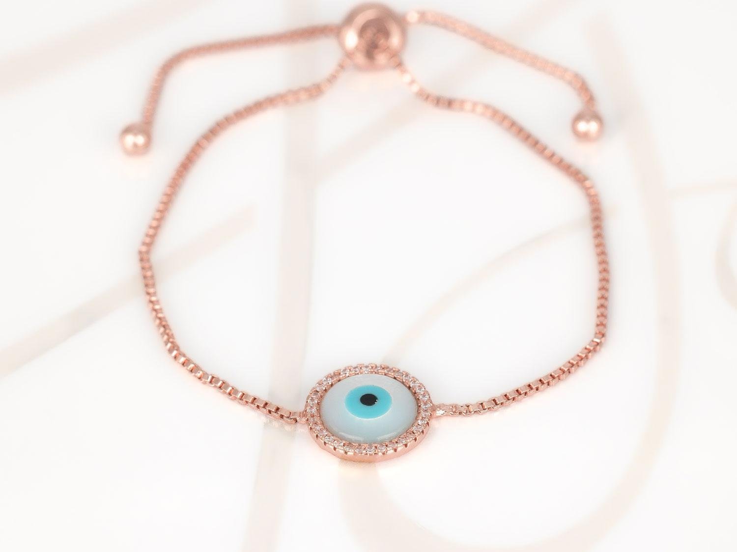PULSERA CON DIJE BISUTERIA OJO ZIRCONIA CADENA