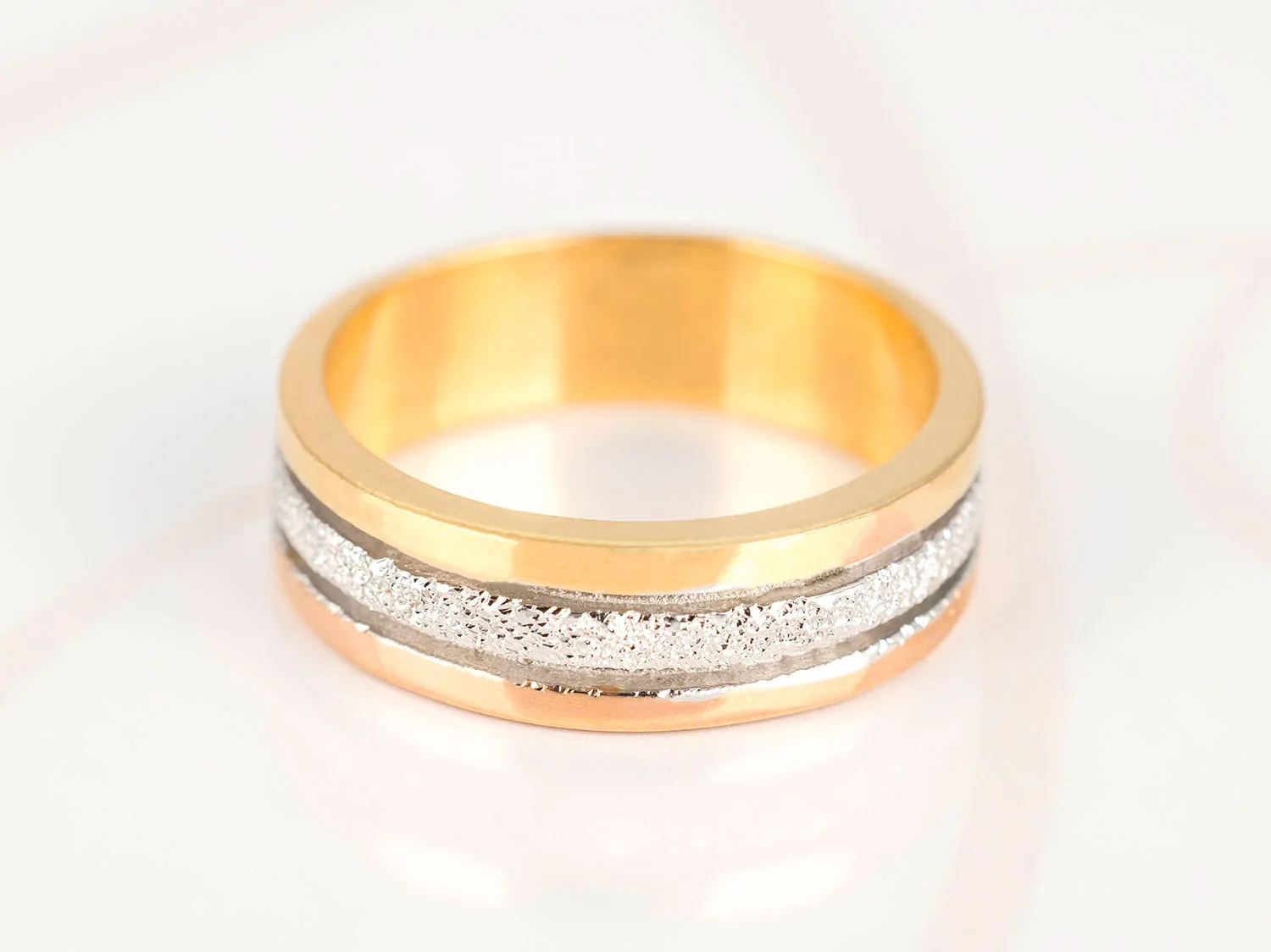 ANILLO ORO LAMINADO TRIPLE LINEA DIAMANTADO