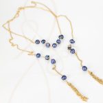 COLLAR SIN DIJE ORO LAMINADO POMPONES CORBATERO PERLA