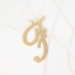 DIJE ORO LAMINADO CURSIVA F LISO