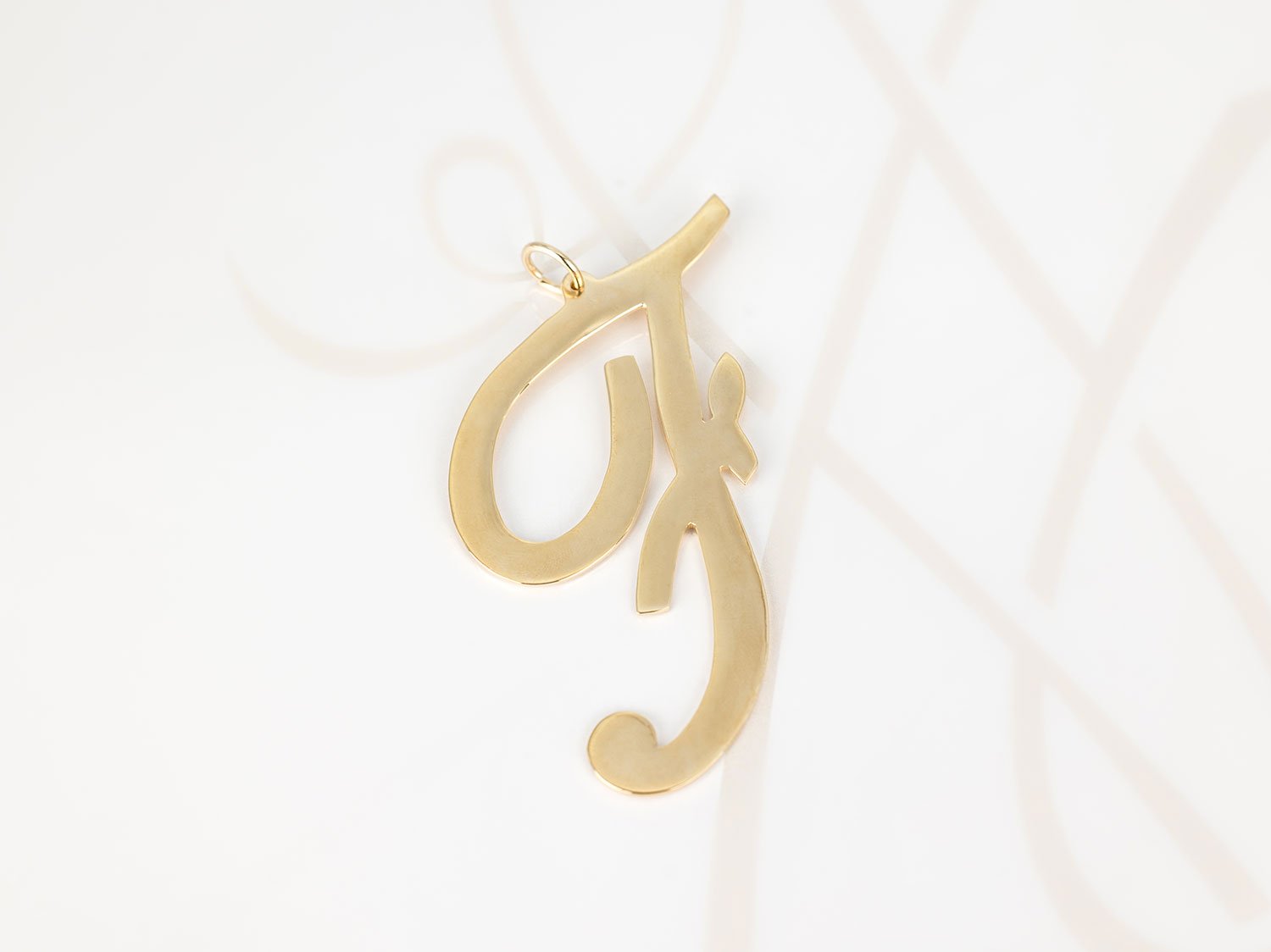 DIJE ORO LAMINADO CURSIVA F LISO