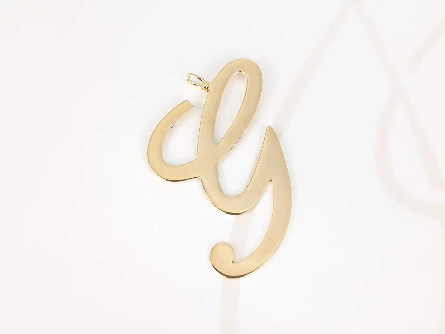 DIJE ORO LAMINADO CURSIVA G LISO