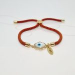 PULSERA MANO FATIMA CORDON NARANJA