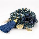 PULSERA CON DIJE ORO LAMINADO FLOR POMPON CRISTAL