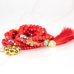 PULSERA CON DIJE ORO LAMINADO BARRO POMPON CRISTAL