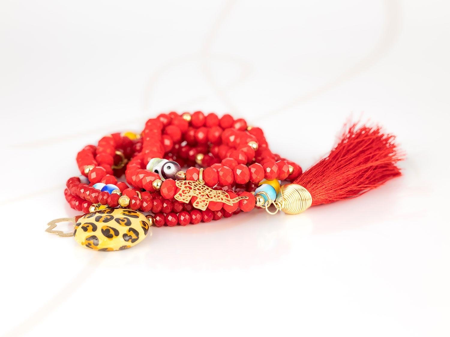 PULSERA CON DIJE ORO LAMINADO BARRO POMPON CRISTAL