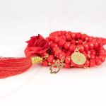 PULSERA CON DIJE ORO LAMINADO FLOR POMPON CRISTAL