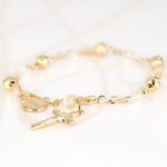 PULSERA CON DIJE ORO LAMINADO MISTERIO MEDIANO FILIGRANA