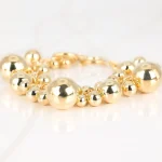 PULSERA SIN DIJE ORO LAMINADO PACHONA BOLAS LISO