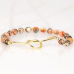 PULSERA SIN DIJE ORO LAMINADO NUDO PIEDRA