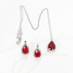 JUEGO PLATA RODIZADA RUBI GOTA HALO TOPACIO BLANCO CON CADENA