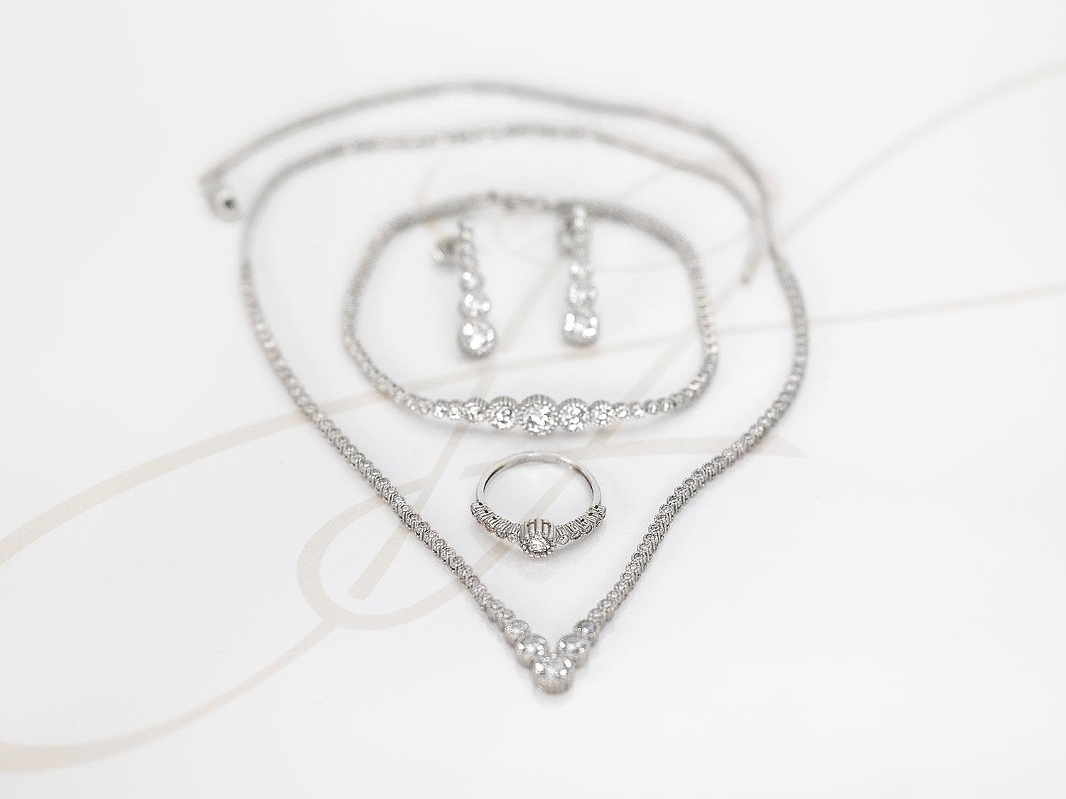 JUEGO PLATA RODIZADA SET COMPLETO CIRCULOS ASIMETRICOS TOPACIO BLANCO
