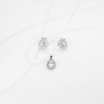JUEGO PLATA RODIZADA OVALO ENMARCADO TOPACIO BLANCO
