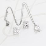 JUEGO PLATA RODIZADA RECTANGULO CON CADENA TOPACIO BLANCO