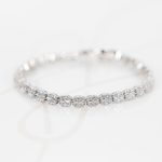 PULSERA PLATA RODIZADA CIRCULOS BAGUETTE TOPACIO BLANCO