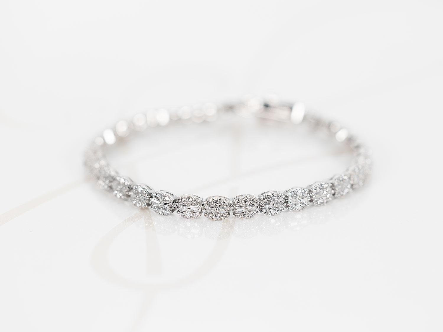 PULSERA PLATA RODIZADA CIRCULOS BAGUETTE TOPACIO BLANCO