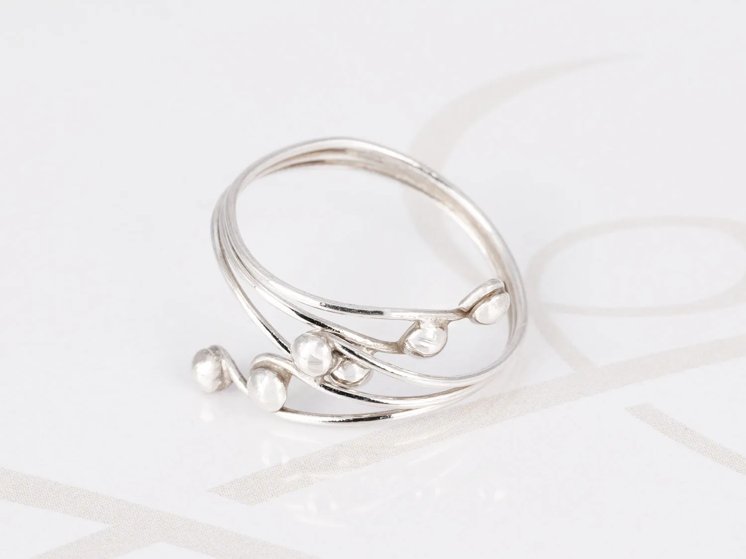 ANILLO PLATA CRUZADO TRIPLE BOLA