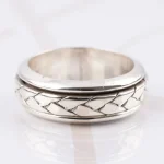 ANILLO PLATA ARGOLLA TRENZADA GIRATORIO