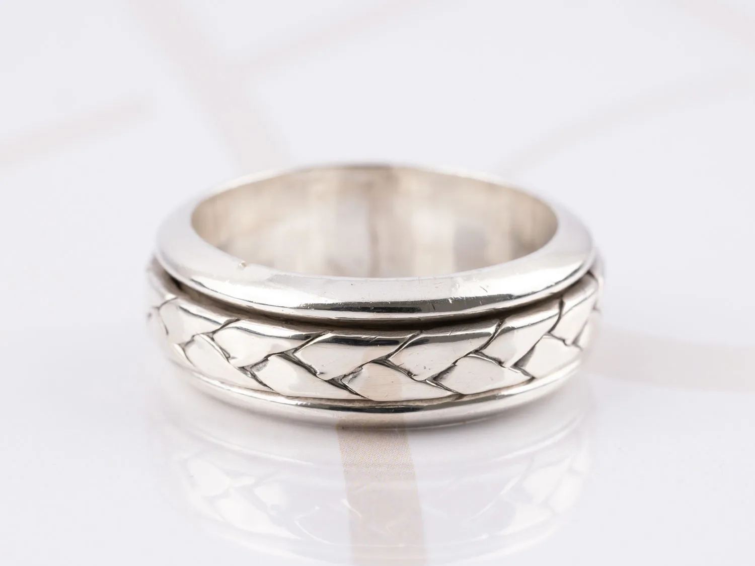 ANILLO PLATA ARGOLLA TRENZADA GIRATORIO
