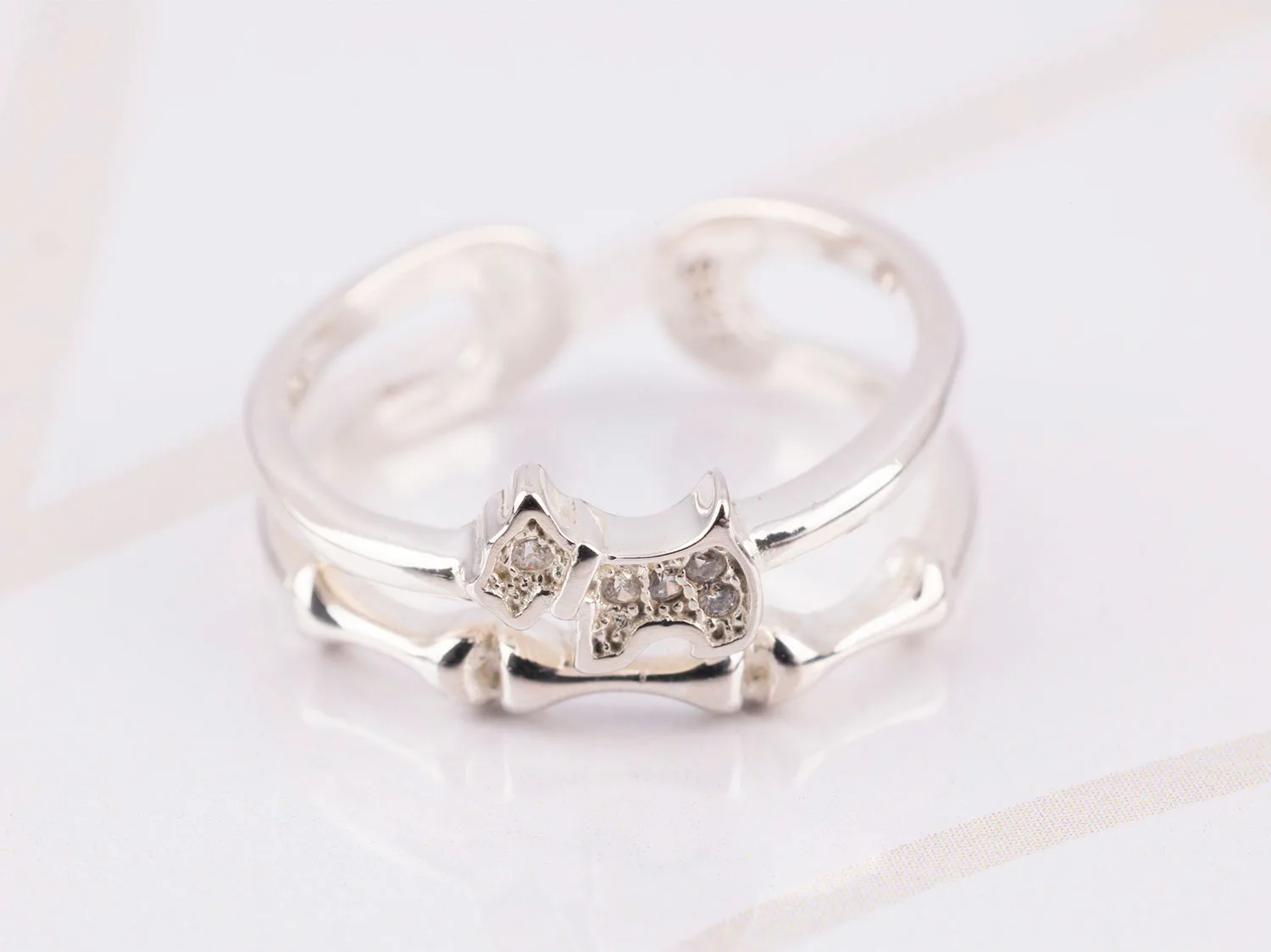 ANILLO PLATA PERRO Y HUESO ZIRCONIA