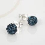 BROQUEL PLATA PETROLEO BOLA DE FUEGO