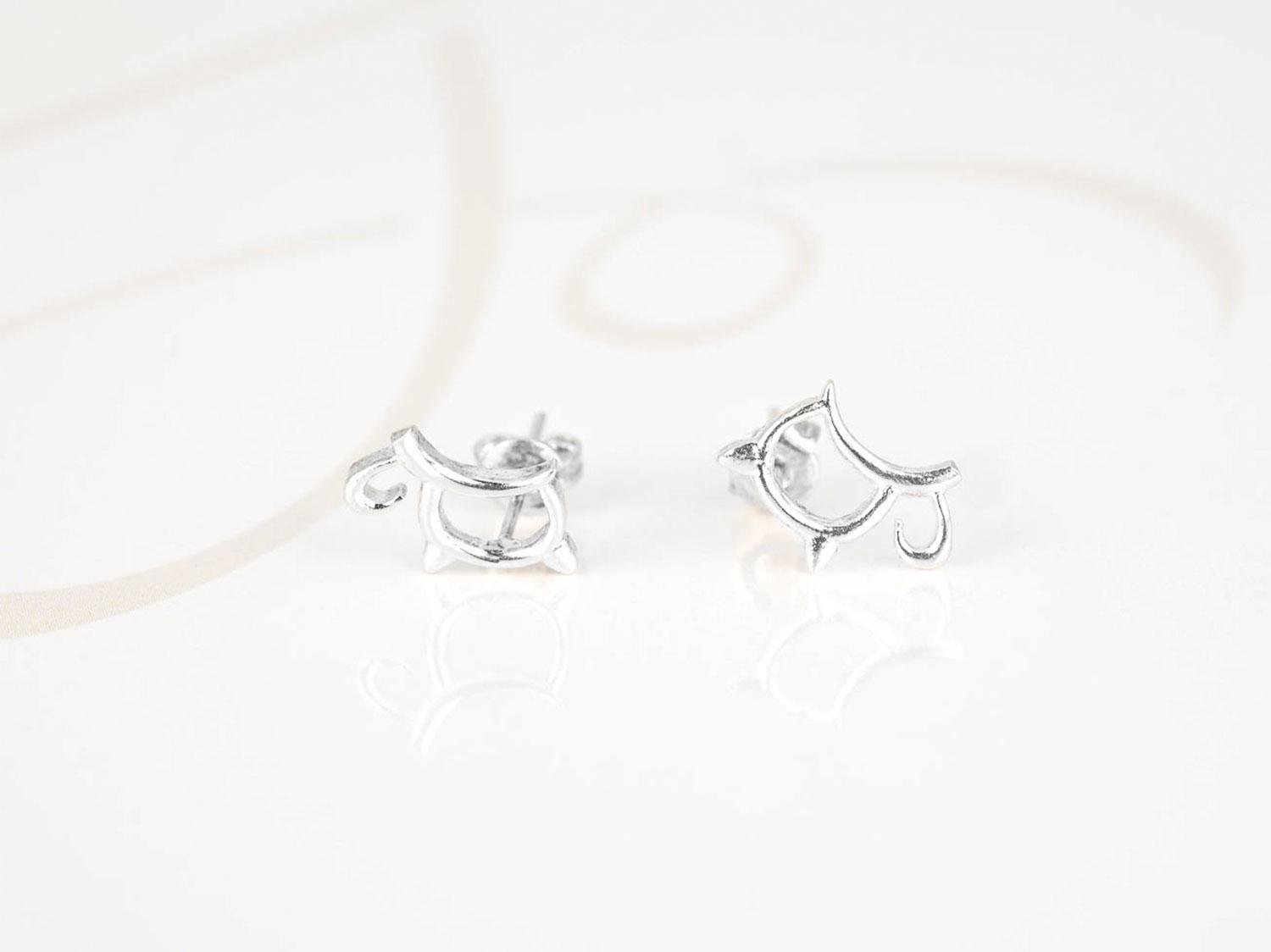 BROQUEL PLATA SILUETA VACA LISO