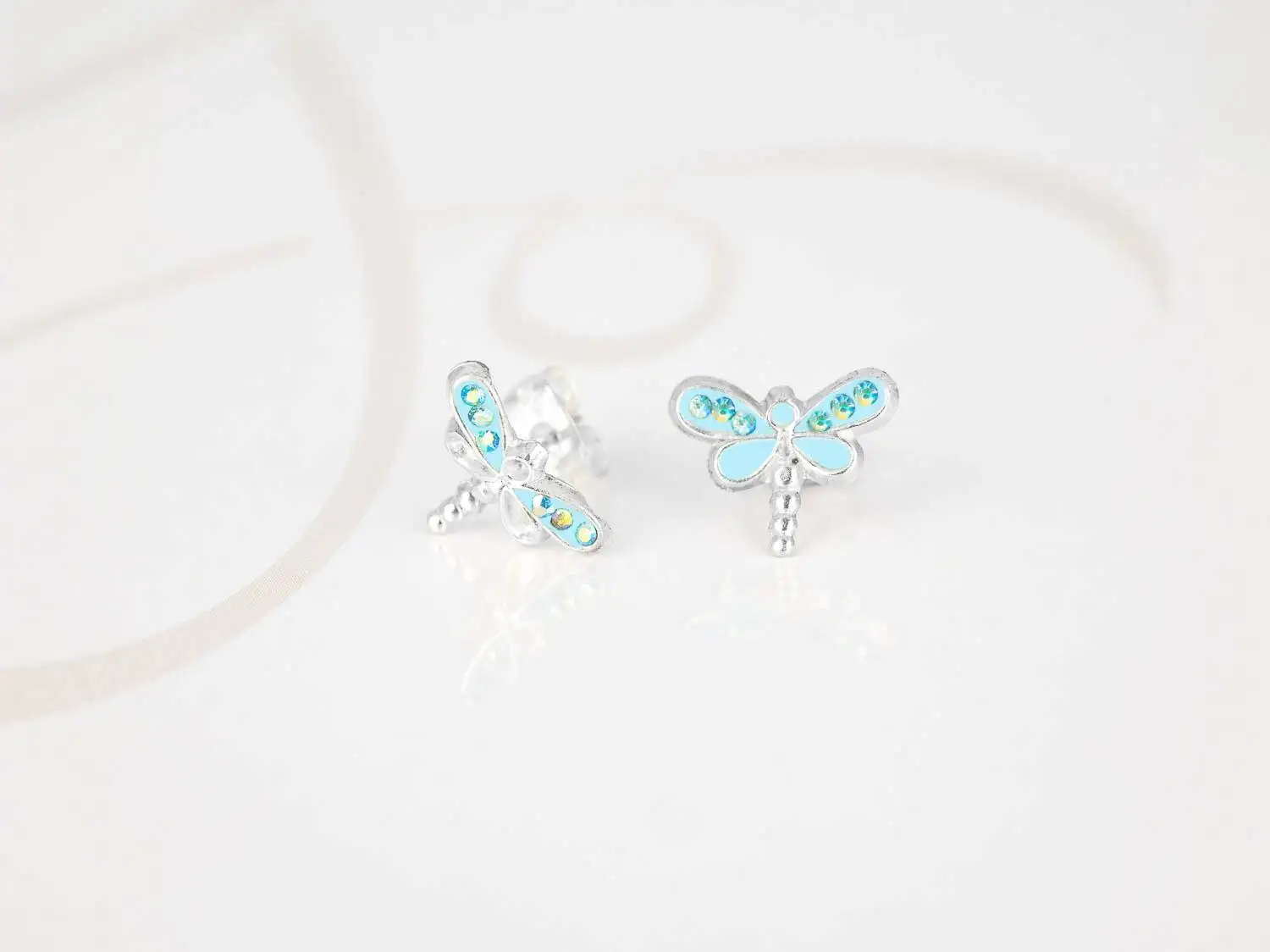 BROQUEL PLATA LIBELULA ZIRCONIA