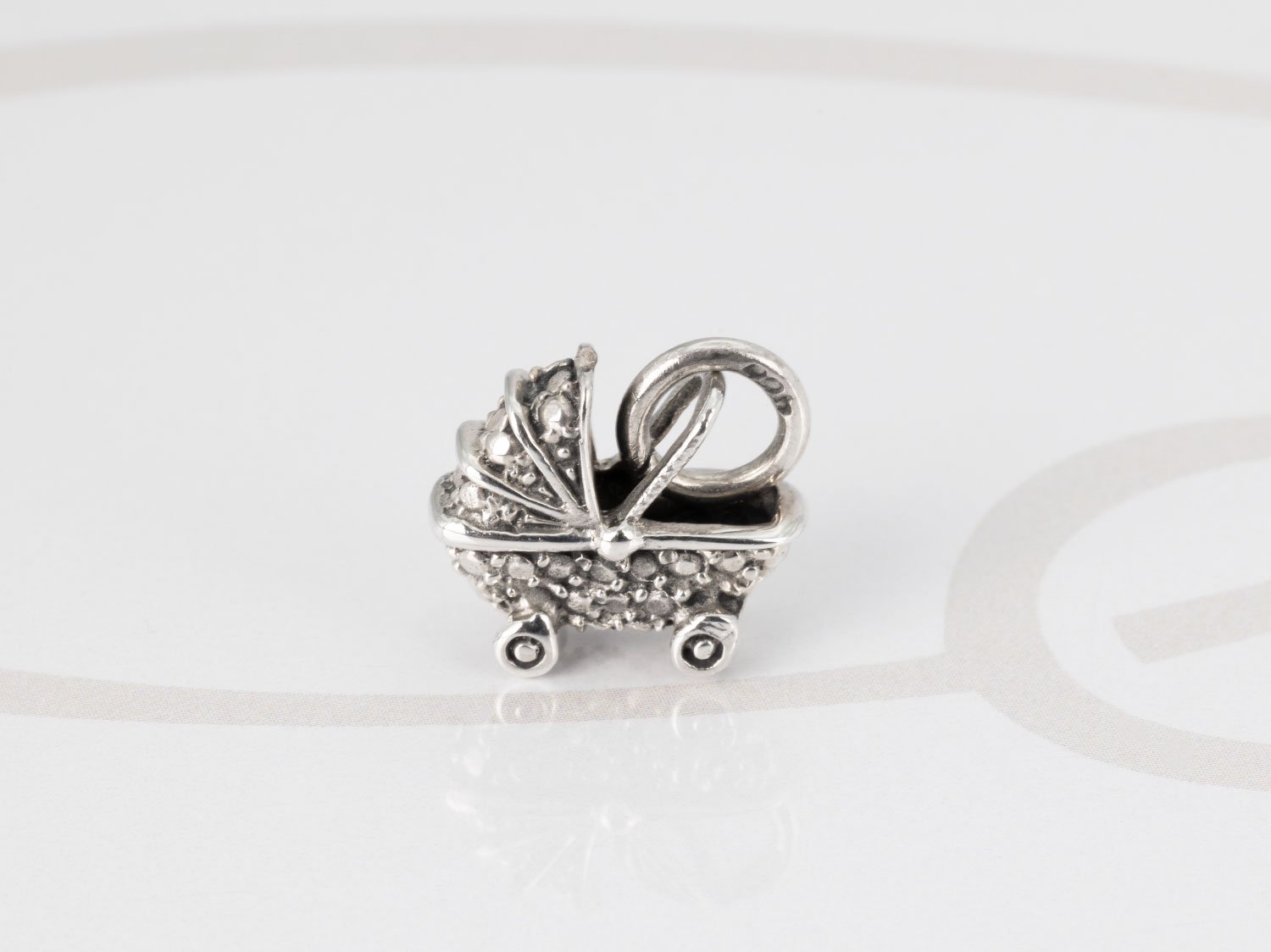 DIJE PLATA CARRIOLA FIGURA