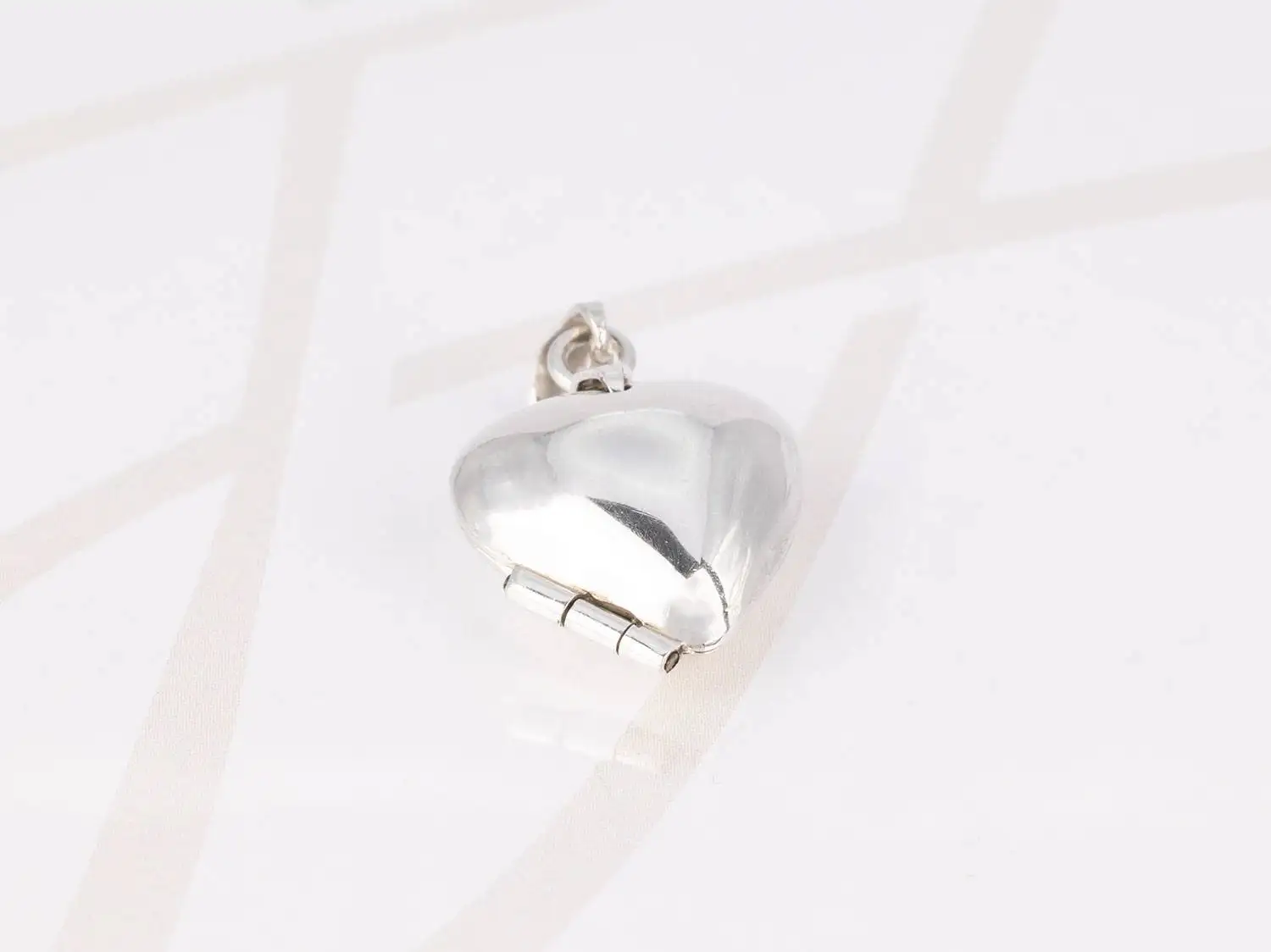 DIJE PLATA GUARDAPELO CORAZON LISO