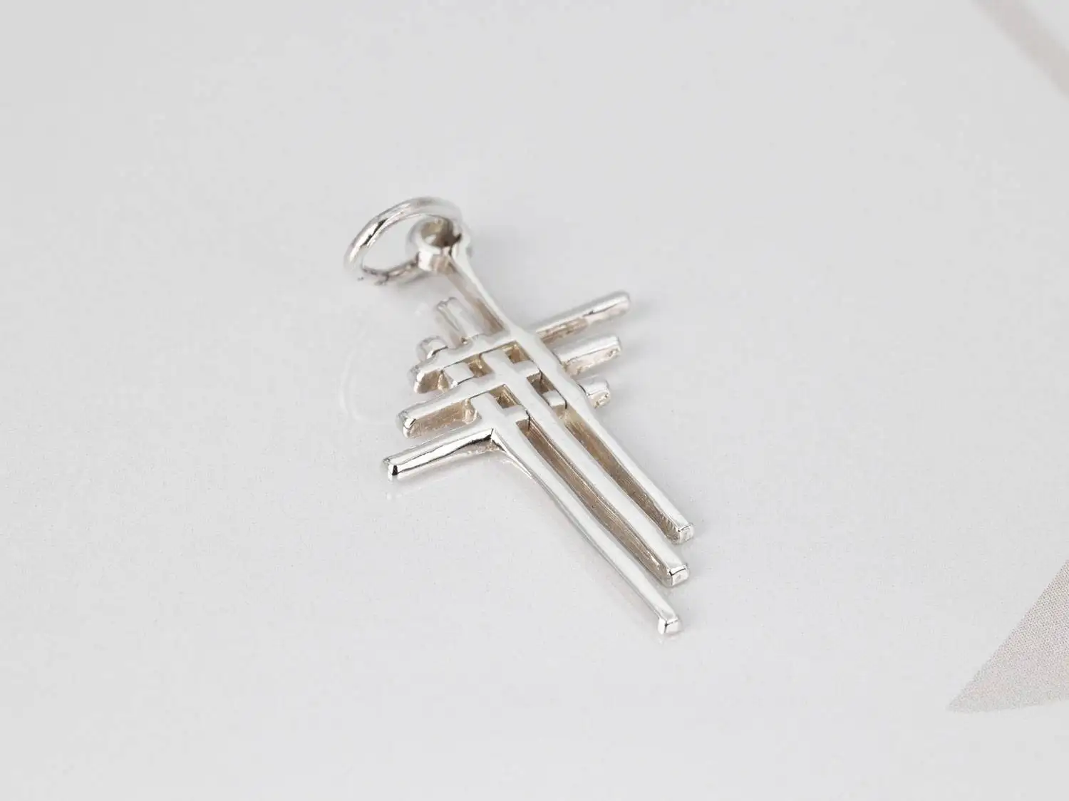 DIJE PLATA TRIPLE CRUZ LISO