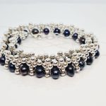 JUEGO DOBLE TEJIDO PERLA NEGRO