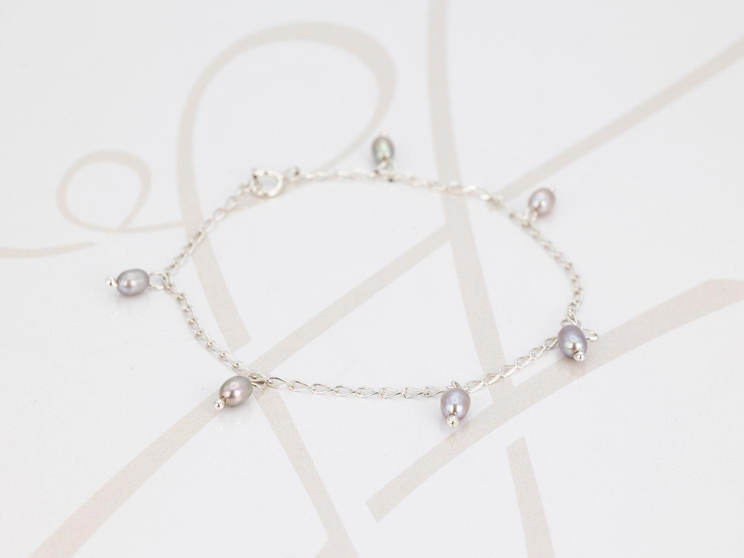 PULSERA CON DIJE PLATA DIJE PERLA CADENA