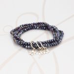 PULSERA CON DIJE PLATA FLOR TRIPLE CRISTAL
