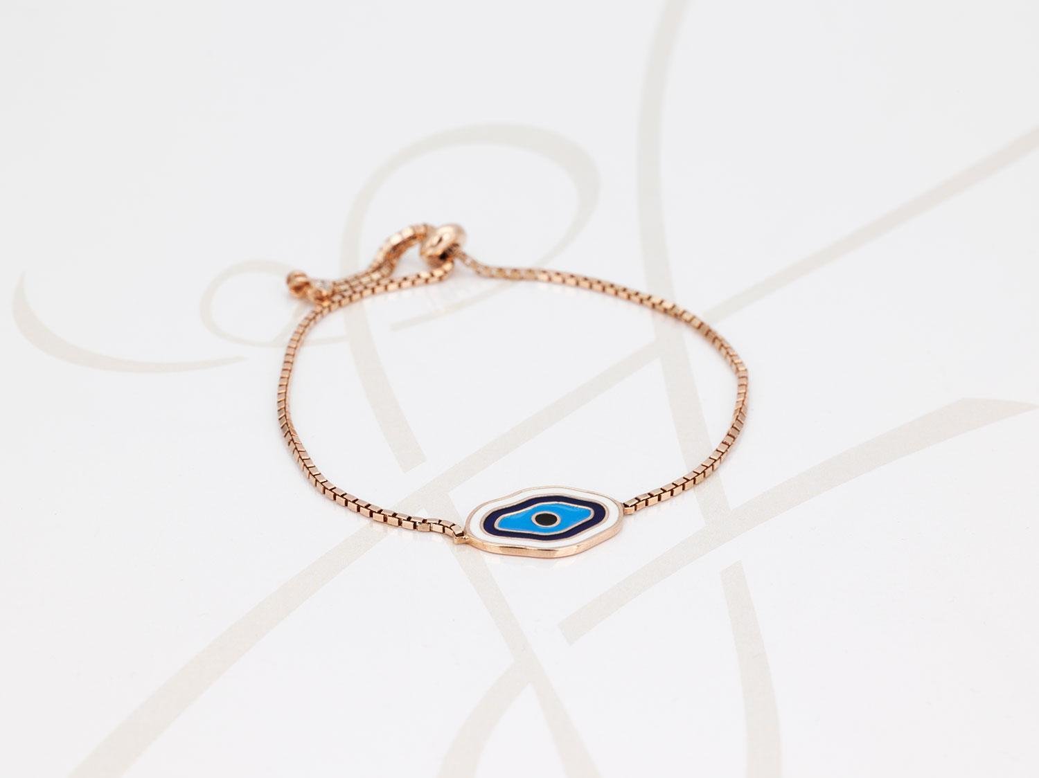 PULSERA CON DIJE PLATA OJO ESMALTADO ORO ROSA