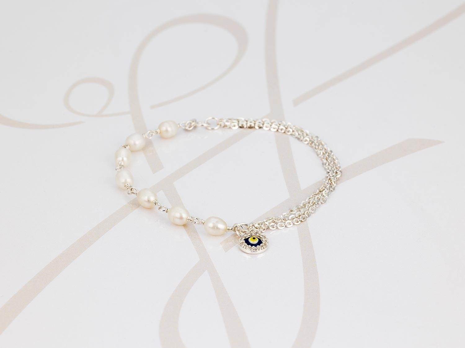 PULSERA CON DIJE PLATA OJO TURCO PERLA
