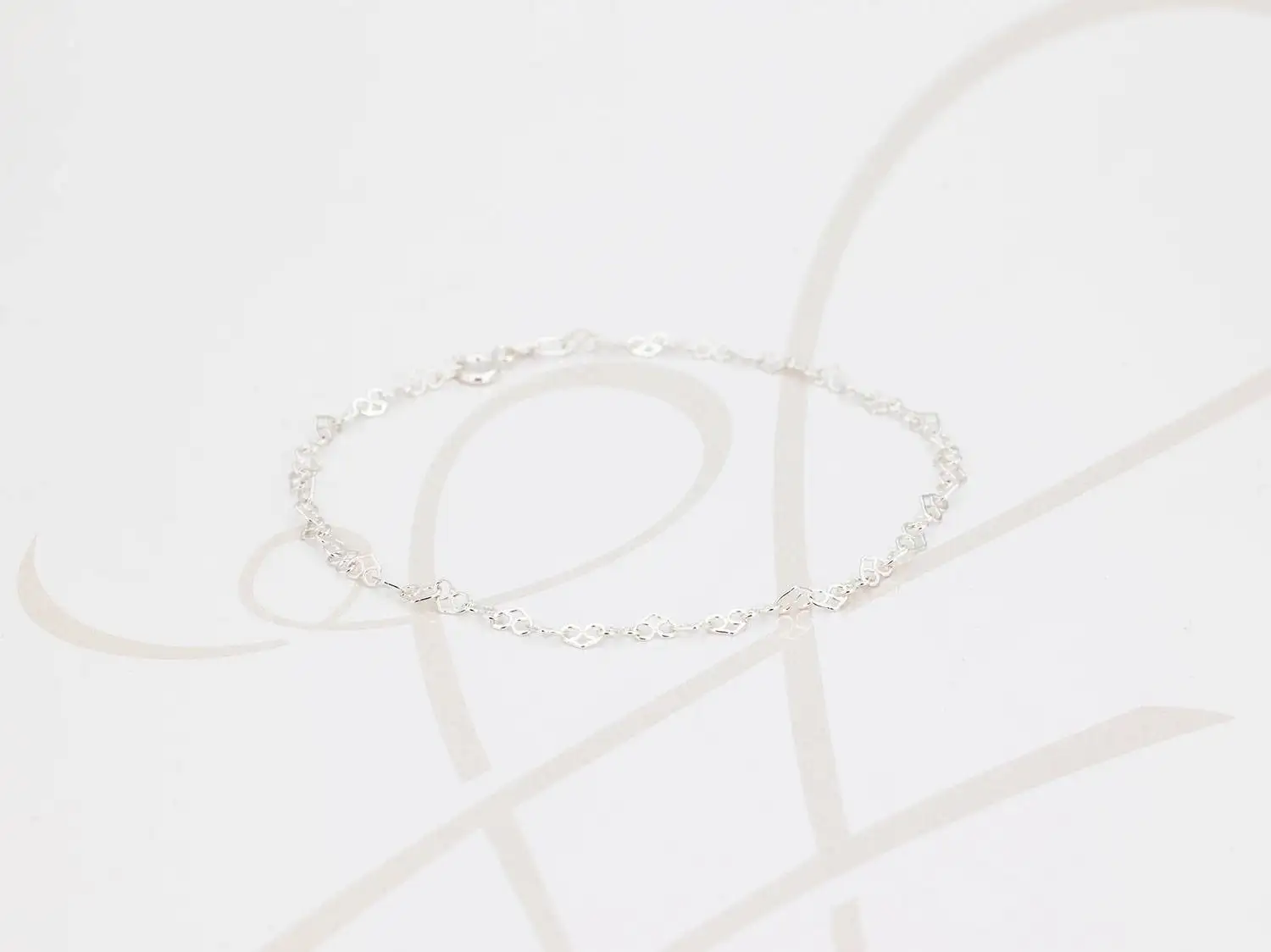 TOBILLERA SIN DIJE PLATA MINI CORAZONES FIGURA