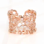 ANILLO RECUBRIMIENTO DE ORO ROSA TEJIDO LISO