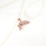 DIJE RECUBRIMIENTO DE ORO ROSA DELFINES ZIRCONIA